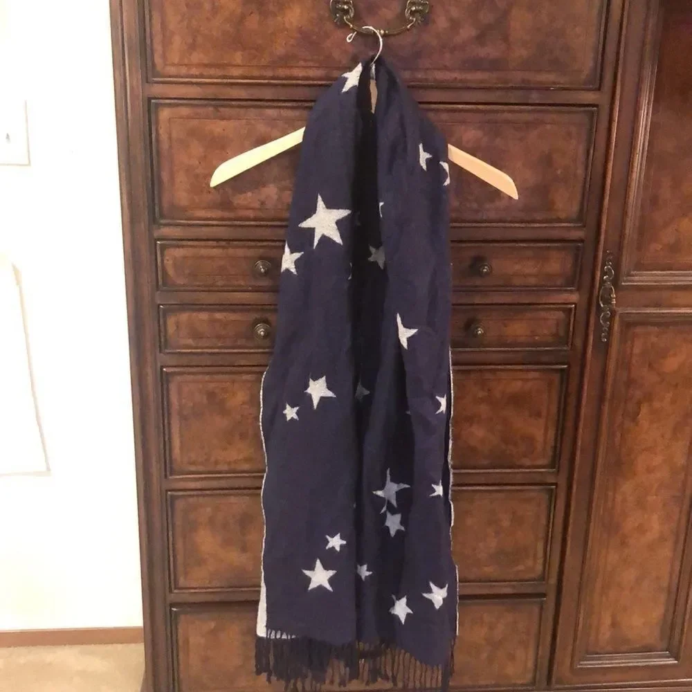 Blue scarf with grey stars on it